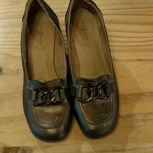 Brown wedges with metal embellishments, size 5.